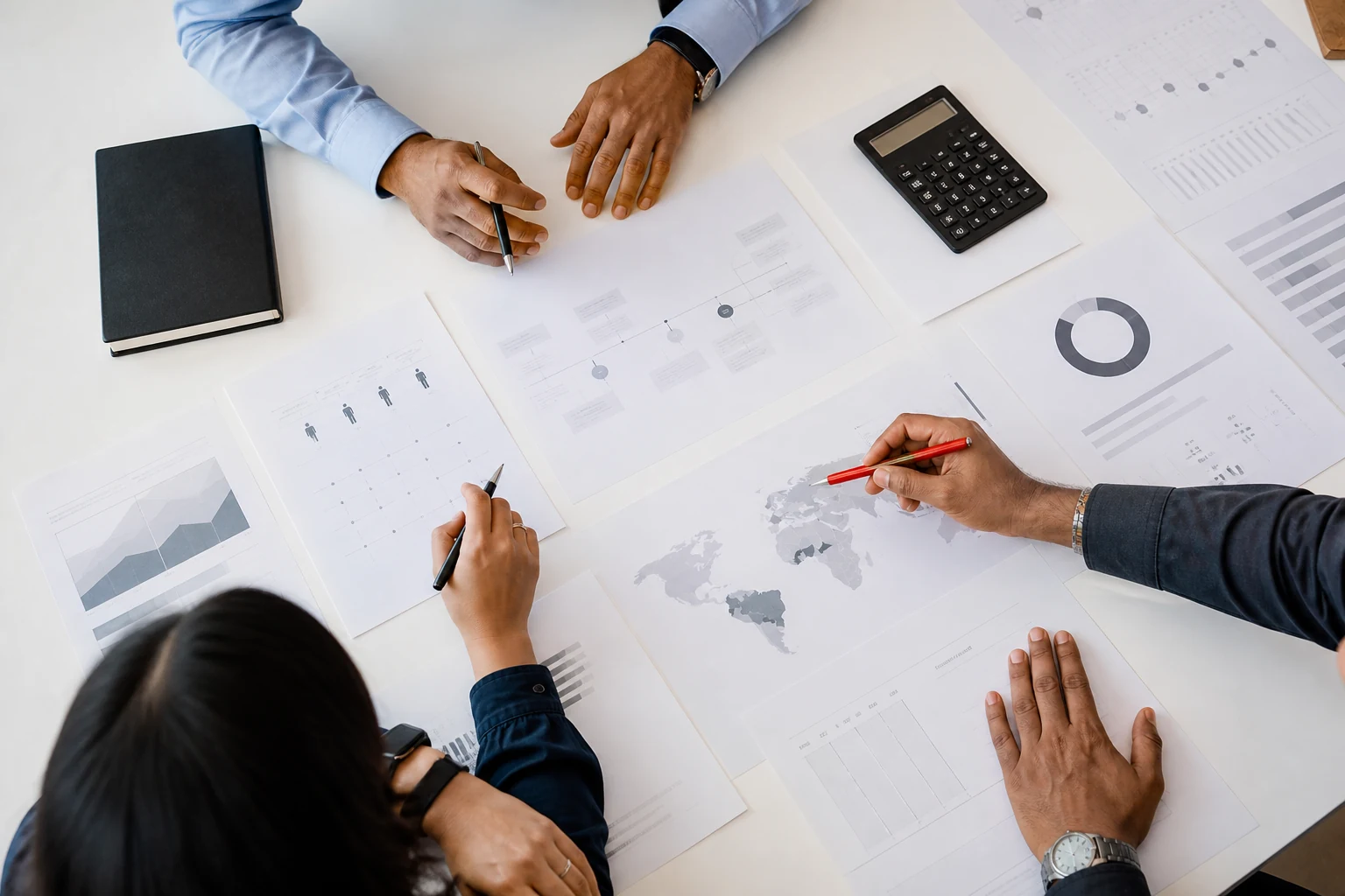 Consultants reviewing market research and business analysis
